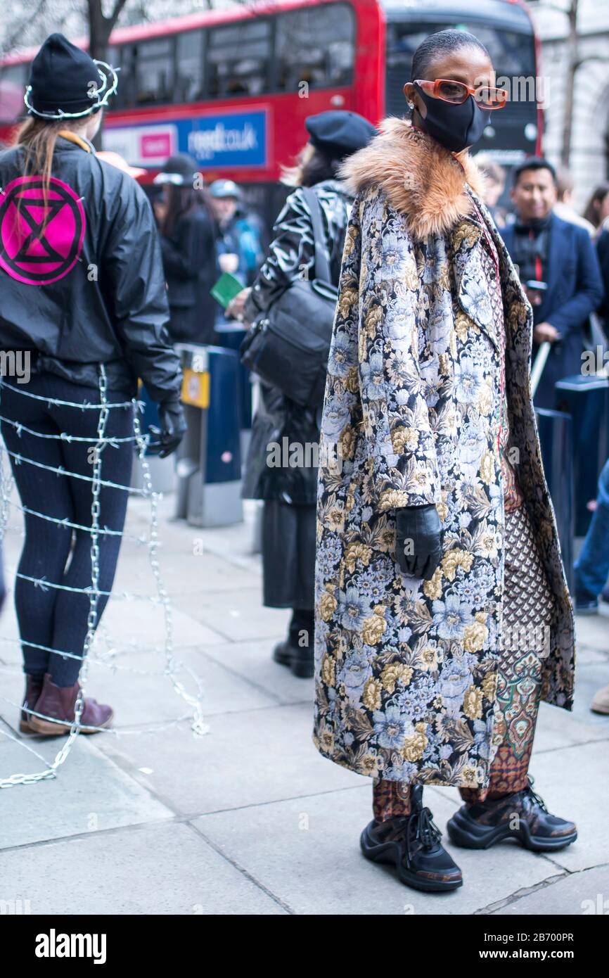 LONDON, UK- febryary 15 2020: Fashionable people on the street . Street style Stock Photo