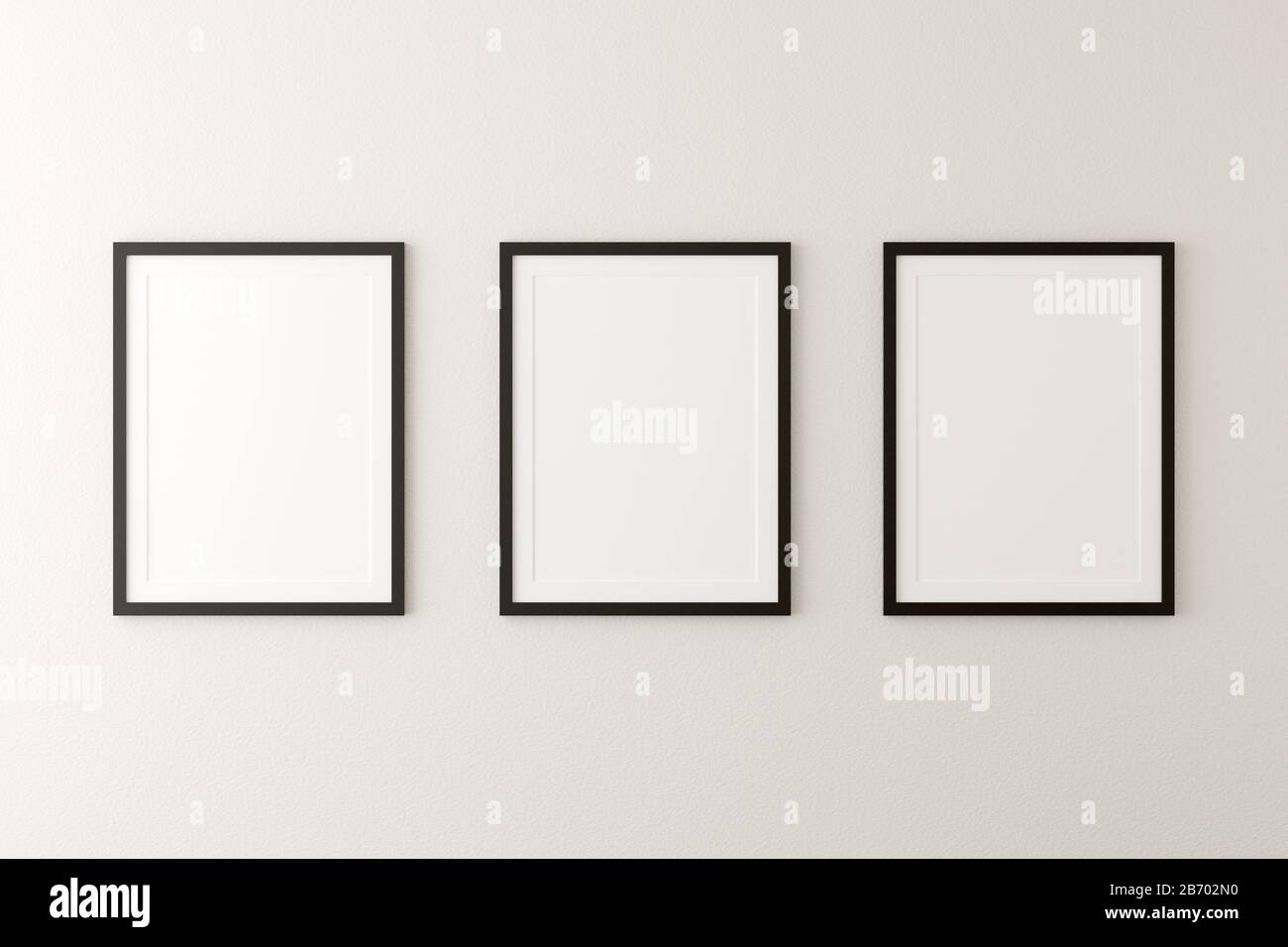 Empty picture frames hanging on white wall in bright room with copy space - portfolio, gallery or artwork template mock up - 3D illustration Stock Photo
