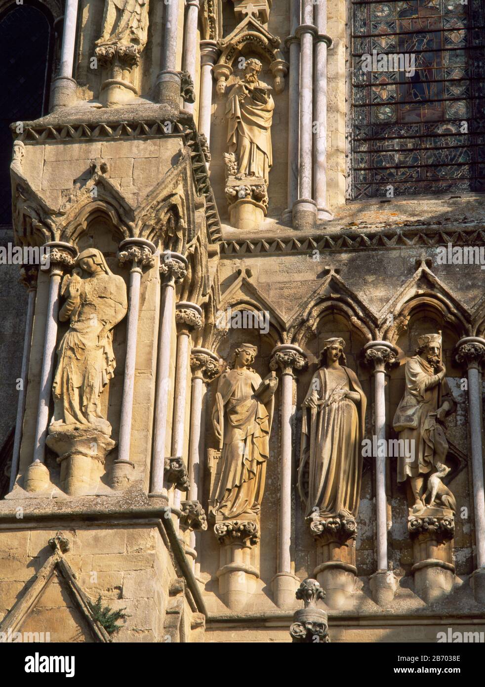 Salisbury Cathedral, detail of statues on West Front, north of West Door. C14th John the Baptist and C19th replacements. Salisbury Cathedral, Wilt Stock Photo