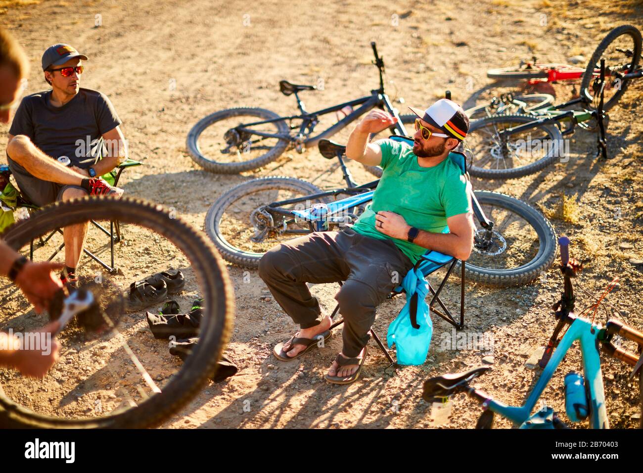 Mountain bikers enjoying post ride beers Stock Photo - Alamy