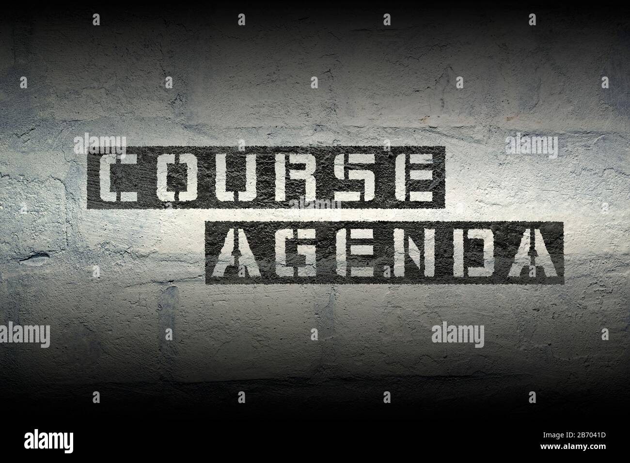 course agenda phrase stencil print on the grunge white brick wall Stock Photo