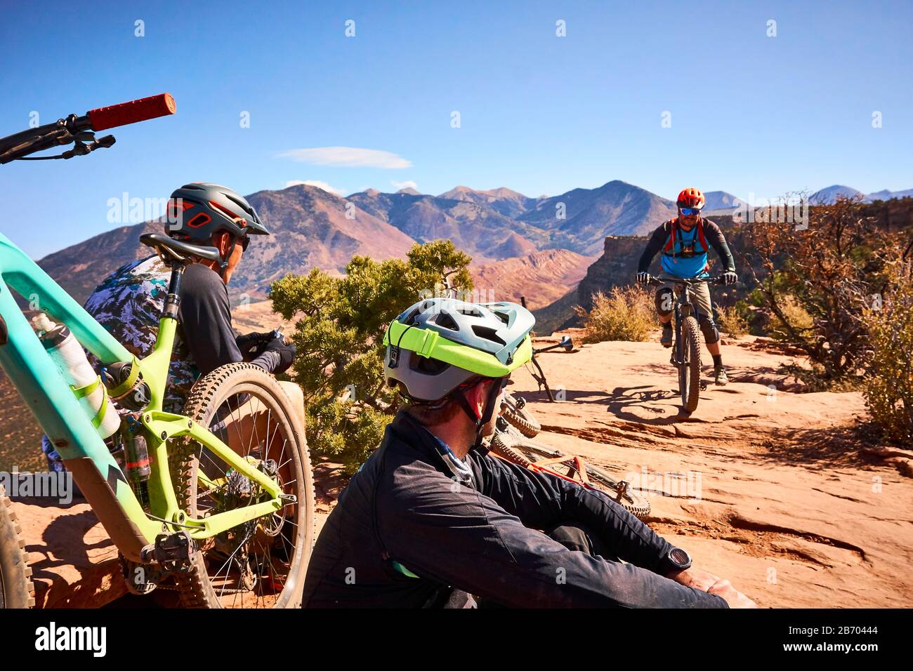 Mountain bikers on The Whole Enchilada trail in Moab, Utah. Stock Photo