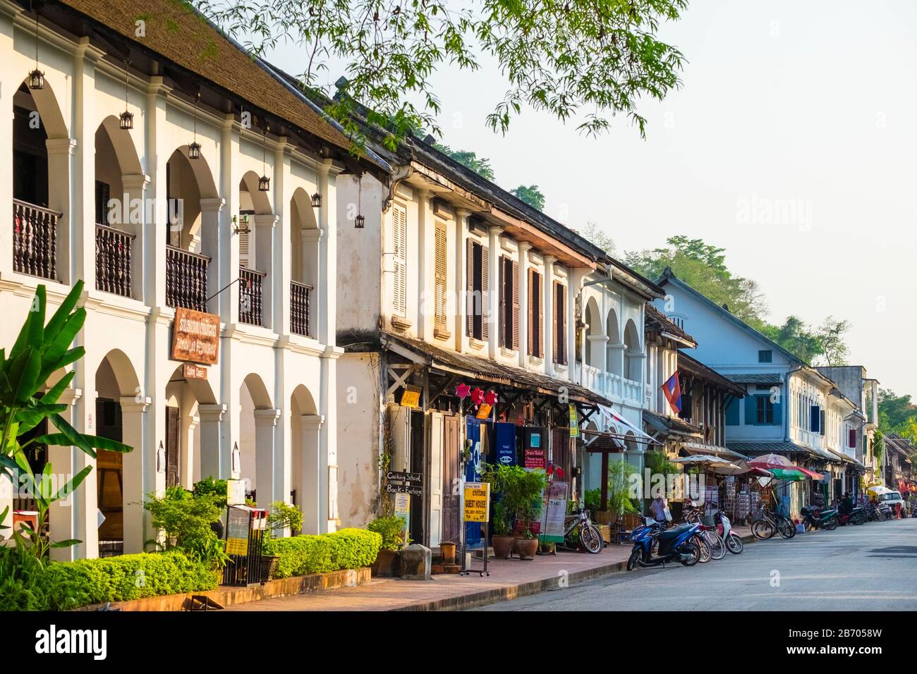 French colonial style buildings on Sakkaline Road in Luang Prabang historic district, Louangphabang Province, Laos Stock Photo