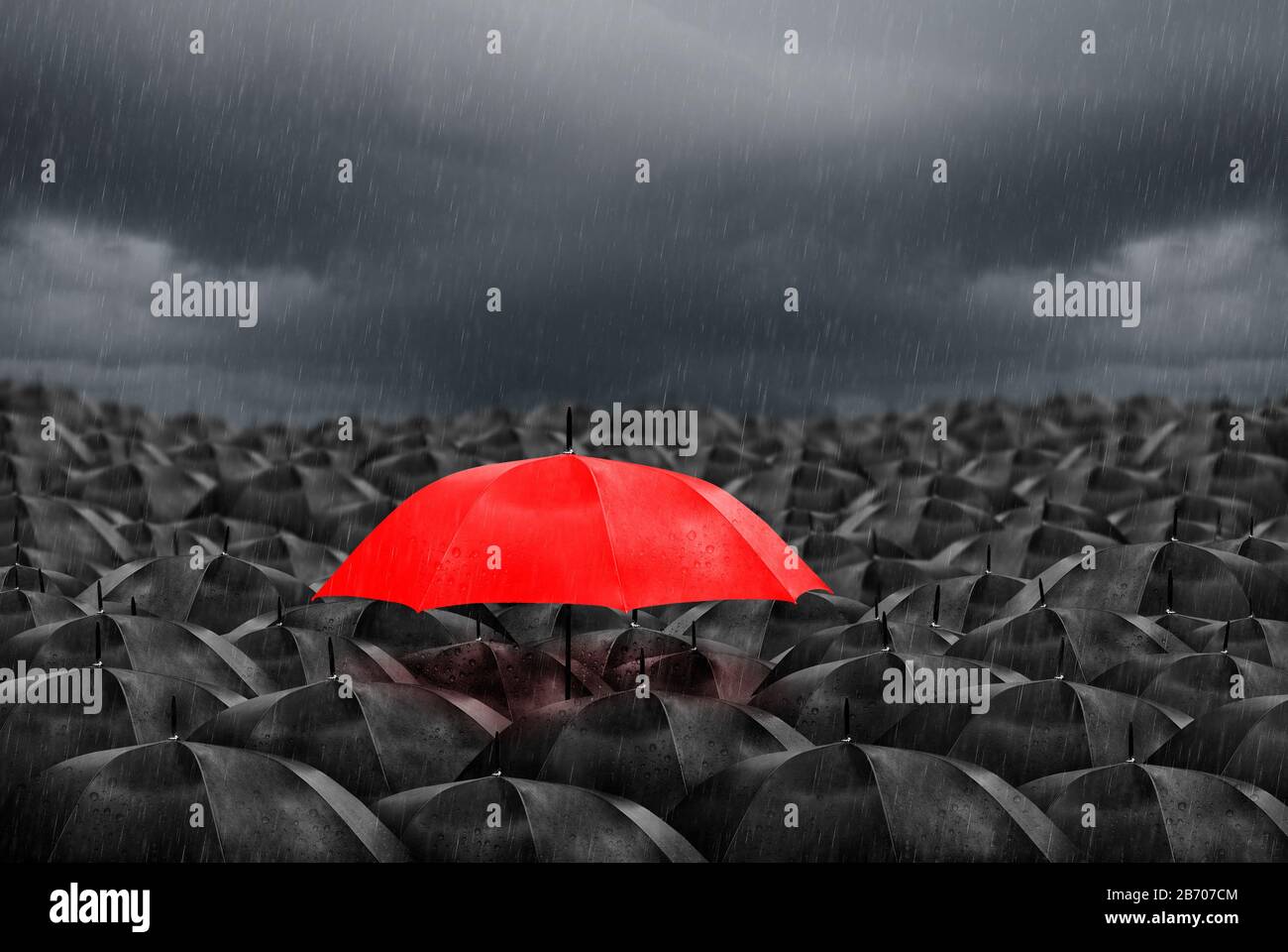 Colorful umbrella in mass of black umbrellas Stock Photo Alamy