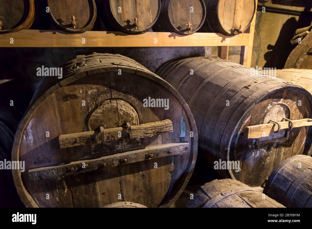Old cellar with barrels of wine Stock Photo Alamy