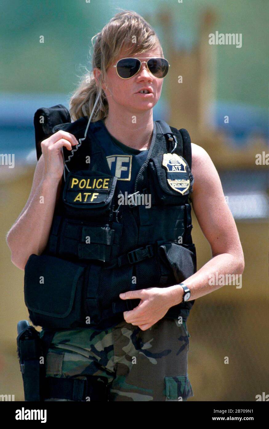 Waco, Texas USA, 1993: Female ATF officer on duty at standoff between ATF agents and the members of the Branch Davidian religious cult. ©Bob Daemmrich Stock Photo