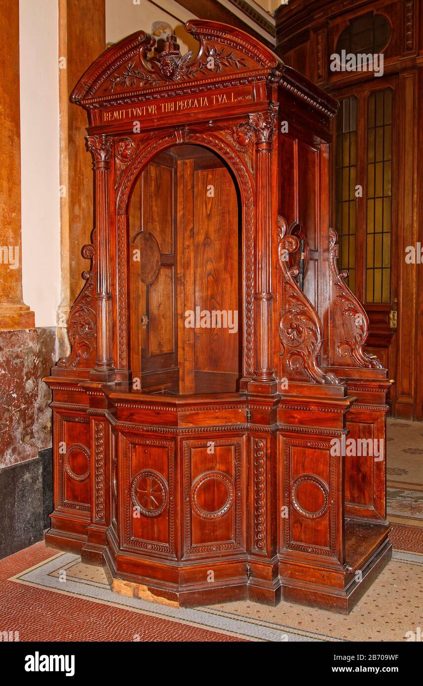 ornate wood confessional, old, sacrament of penance, forgiveness, Metropolitan Cathedral interior; Catholic Church; religious building, South America; Stock Photo