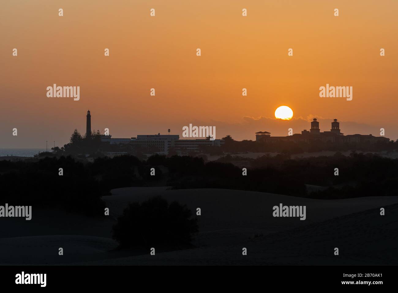 Sunset over the dunes of Maspalomas in Gran Canaria Stock Photo