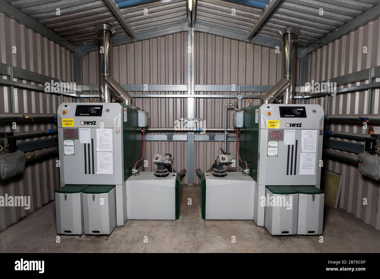 Two biomass boilers on a poultry farm outside of Moira, Co. Down, purchased by poultry farmer Ronnie Wells with the aid of the Northern Irish version of the Renewable Heat Incentive. A public inquiry into the Stormont government's botched handling of the scheme is due to publish its report tomorrow. Stock Photo
