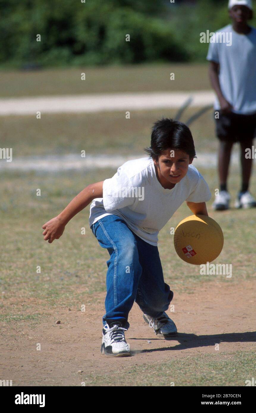 Boy pitching kickball hires stock photography and images Alamy