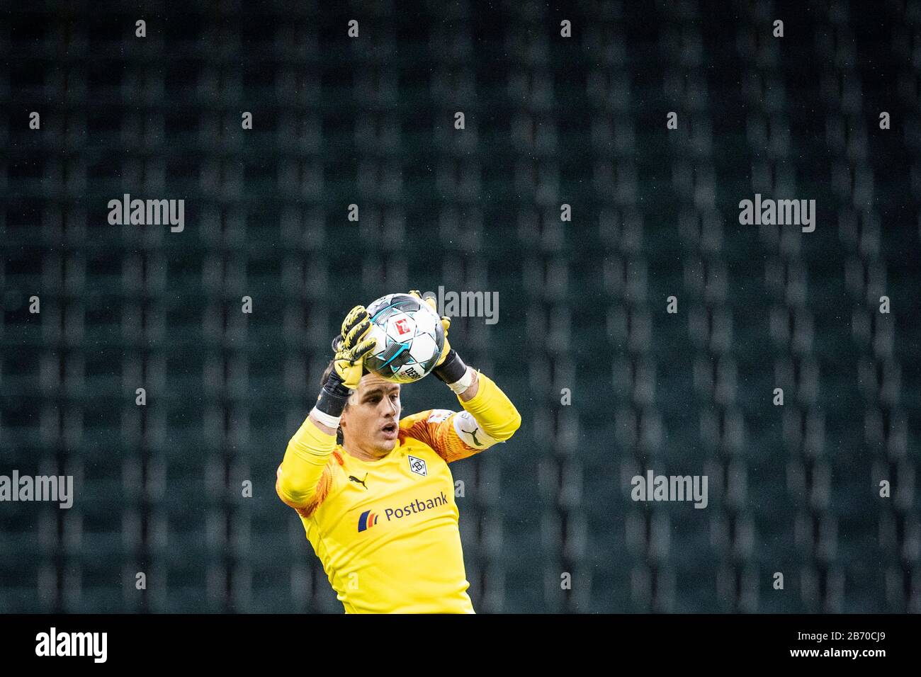 Mönchengladbach, Germany, Borussiapark, 11.03.2020: Goalkeeper Yann Sommer of Bor. Moenchengladbach catches the ball in front of an empty stadium with Stock Photo