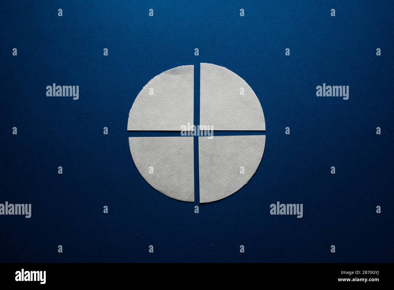 Paper circle cut into four parts Stock Photo Alamy