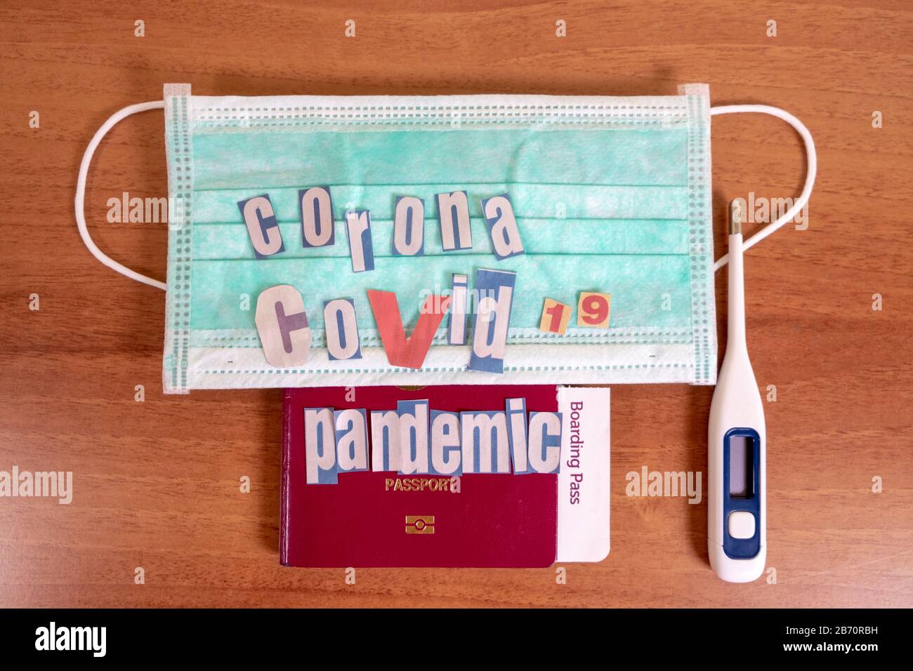 Coronavirus and travel concept. The concept of restrictions for tourism. Passport, thermomether and protective medical masks. Covid19 Corona virus. Stock Photo