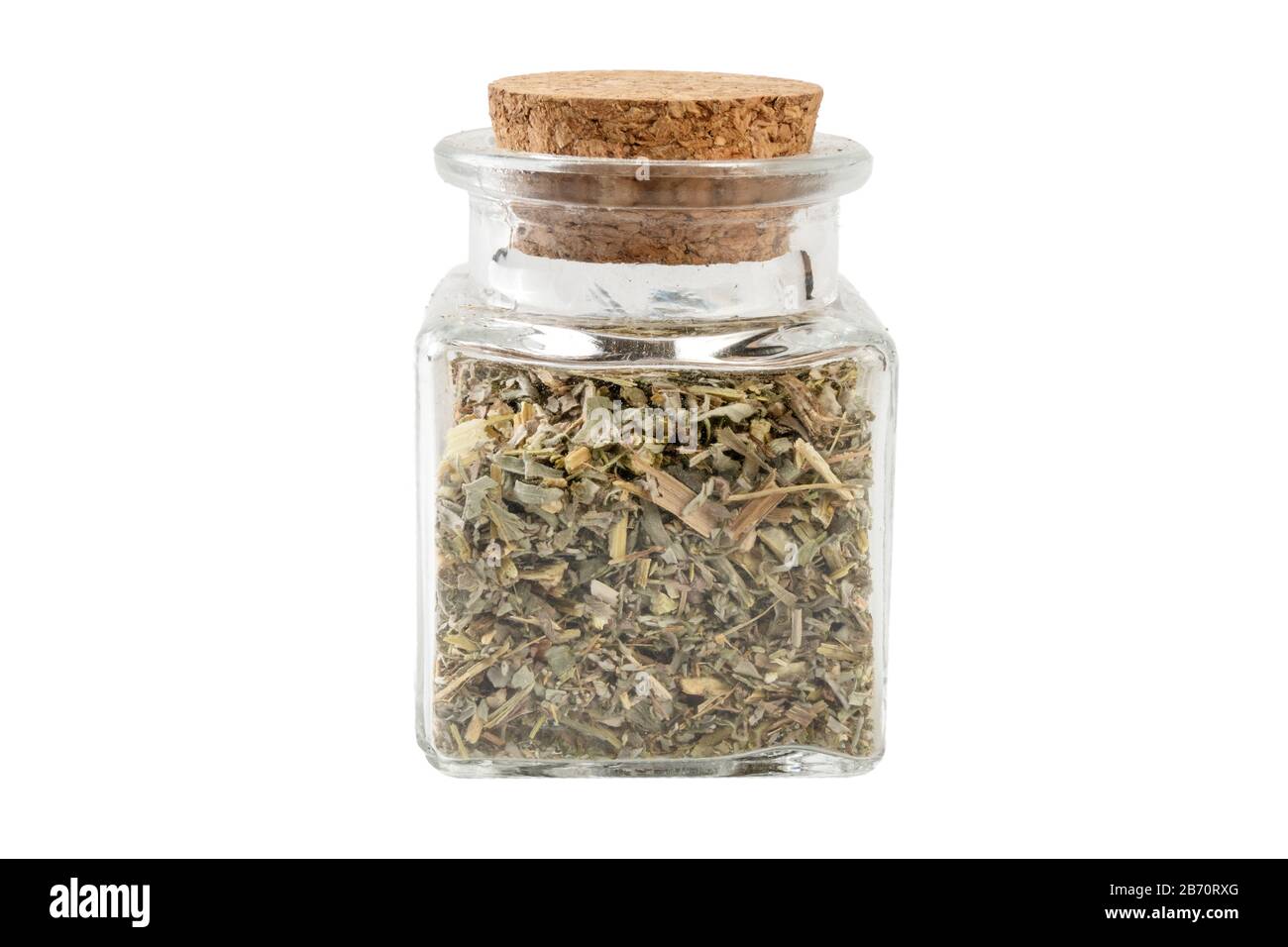 wormwood herb or in latin Absinthii herba herb in a glass jar isolated on white background. medicinal healing herbs. herbal medicine. alternative medi Stock Photo