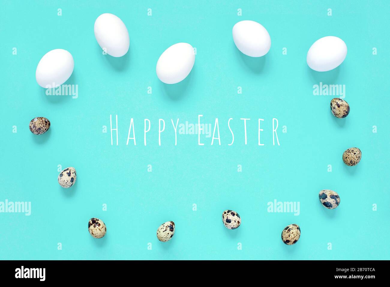 Easter card. Eggs of quail and chicken form a frame. The concept on a light background Stock Photo
