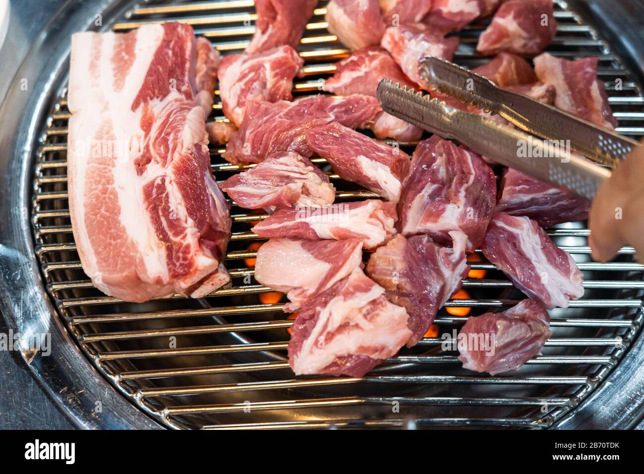 Korean Barbecue (BBQ) Table with Grill and Sides Stock Photo - Alamy