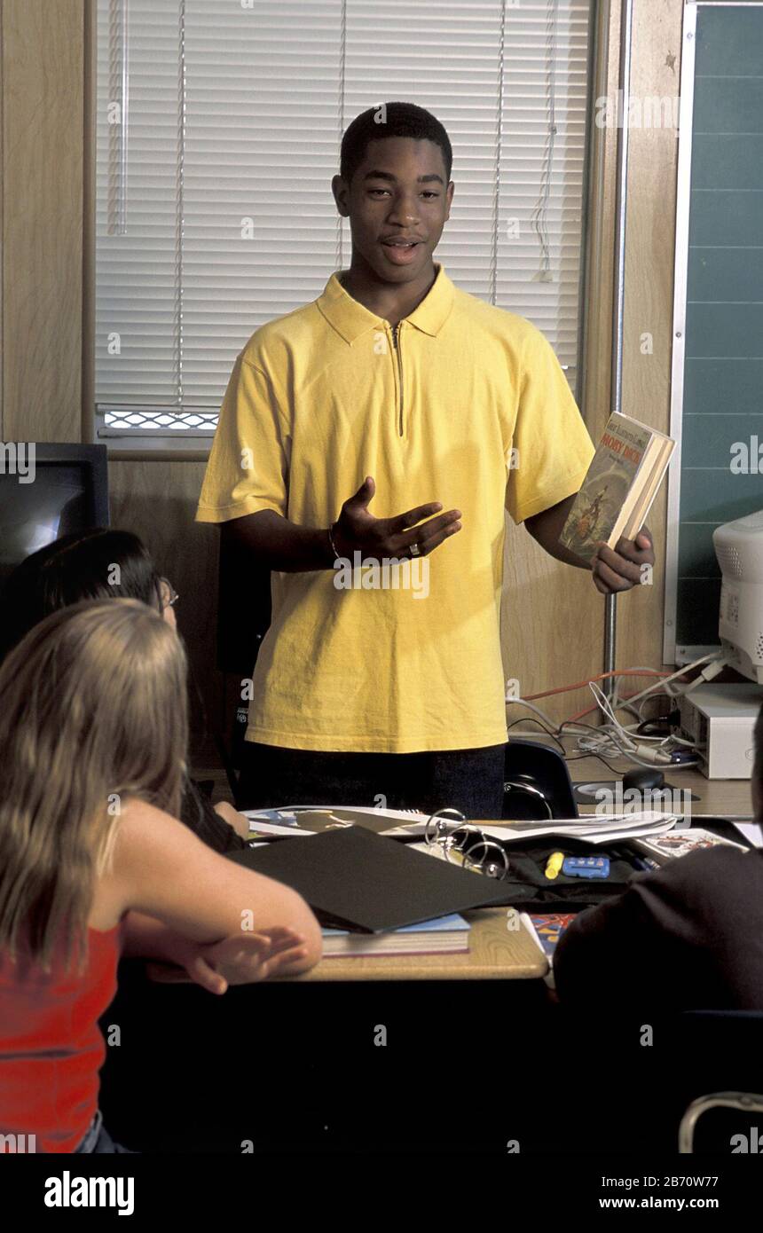 Austin, Texas USA, August 2002: Junior high school student presents report to classmates. MR  ©Bob Daemmrich Stock Photo