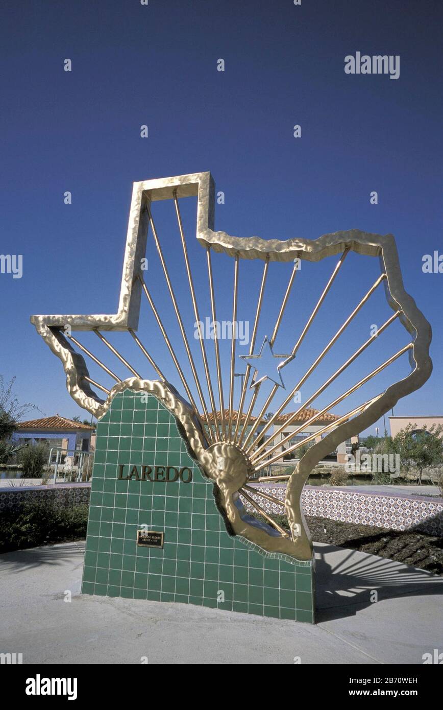Laredo Texas USA: Sculptural sign in shape of the state of Texas with spokes radiating from Laredo's position in the state decorates a roadside rest stop. ©Bob Daemmrich Stock Photo