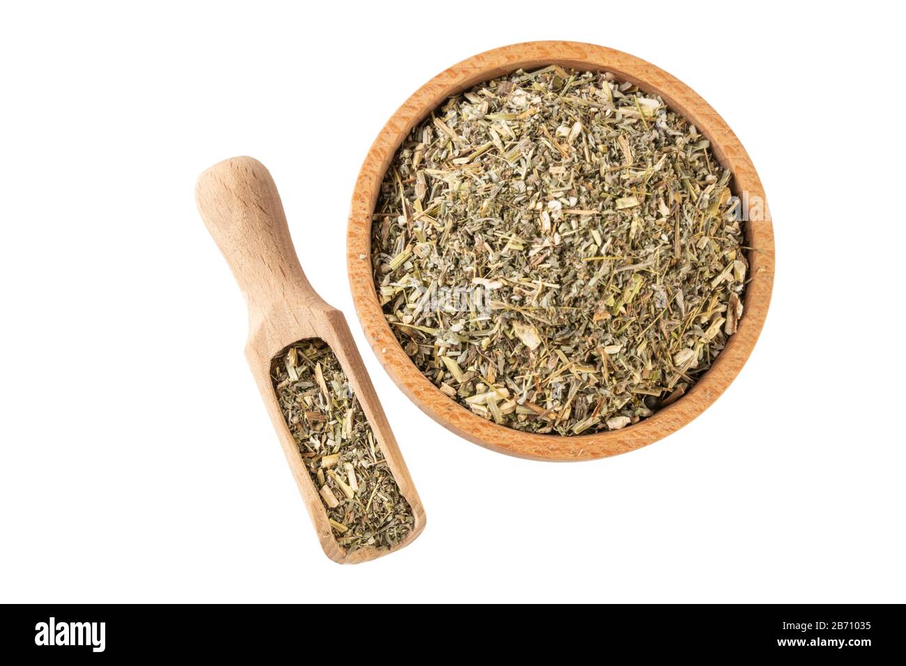 wormwood herb or in latin Absinthii herba herb in wooden bowl and scoop