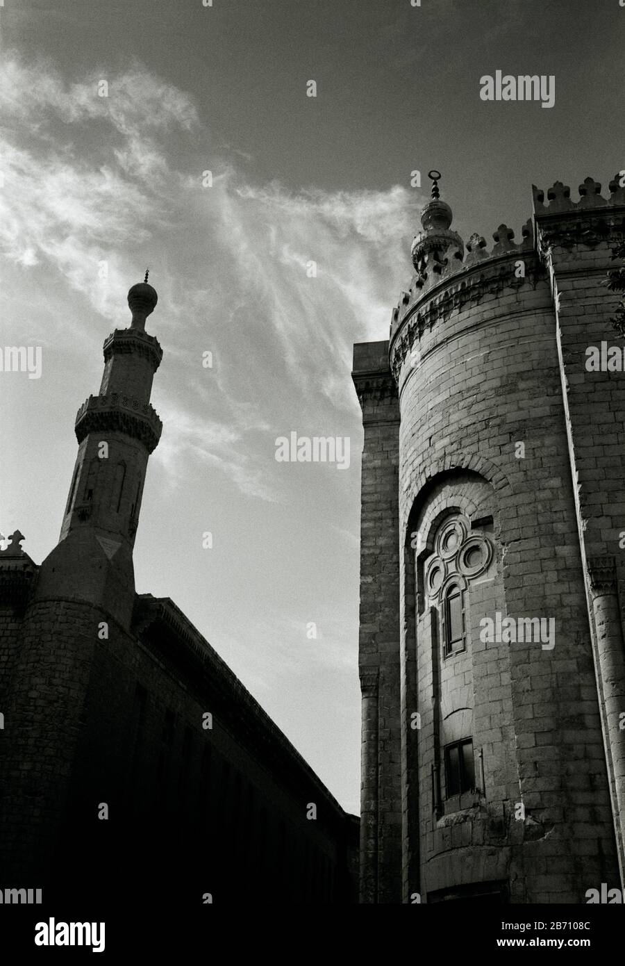 Black And White Travel Photography - Mosque and madrassa of Sultan Hassan and Al Rifai Mosque in Islamic Cairo in Egypt in North Africa Middle East Stock Photo