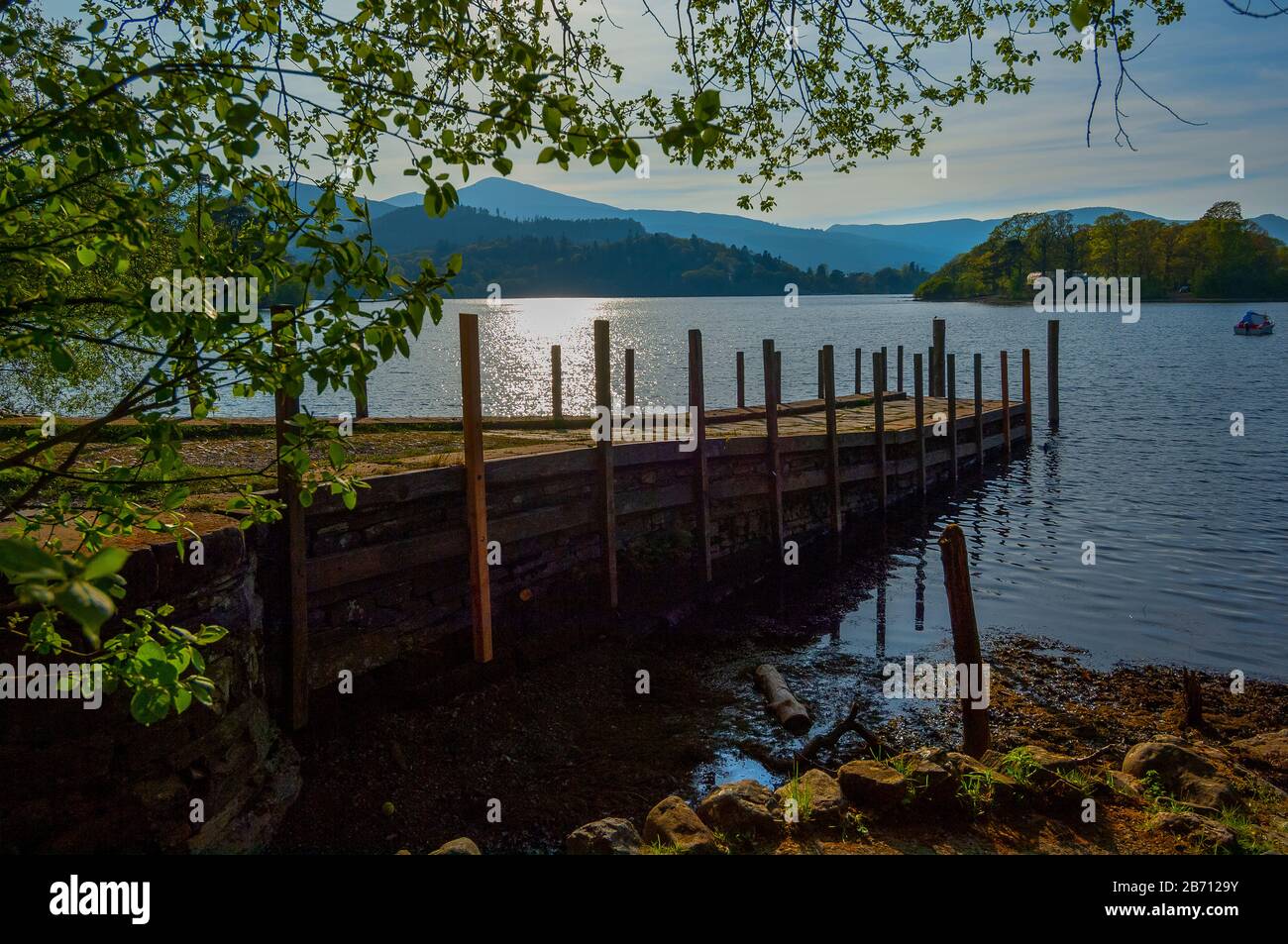 Jetty on Lake Windermere with sunset Stock Photo