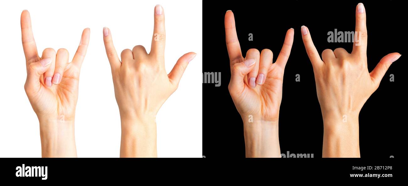 Set of women’s hands showing rock n roll sign or giving the devil 