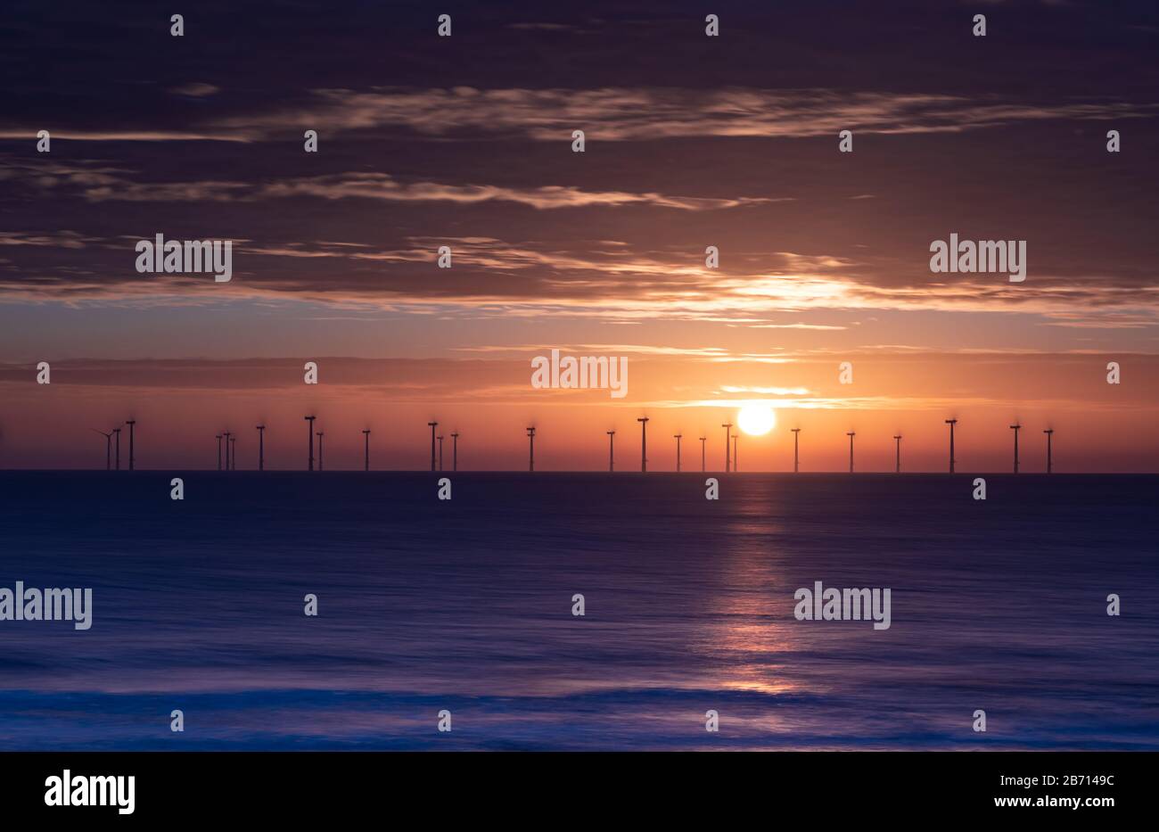Morning Sunrise England East Coast Skegness looking at the wind turbines Stock Photo Alamy
