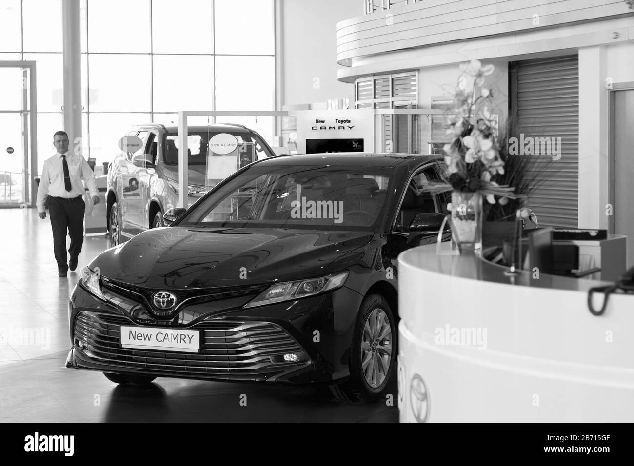 Russia, Izhevsk - April 21, 2018:Showroom Toyota. New vehicle Toyota Camry. Black-and-white image. Front view. Stock Photo