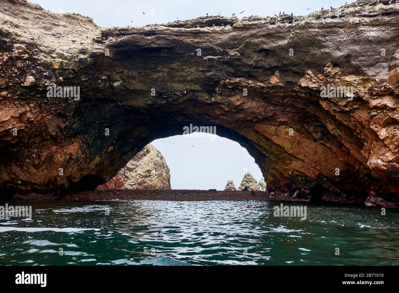 Cave arch at Ballestas Islands, Paracas Stock Photo