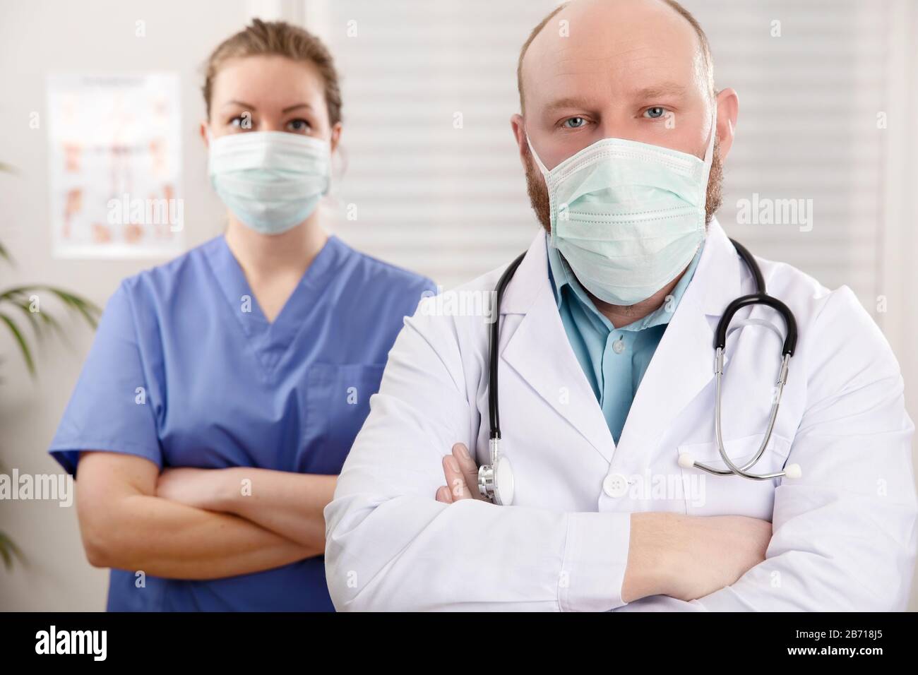 Portrait Of Confident Doctor And Nurse In Hospital Stock Photo