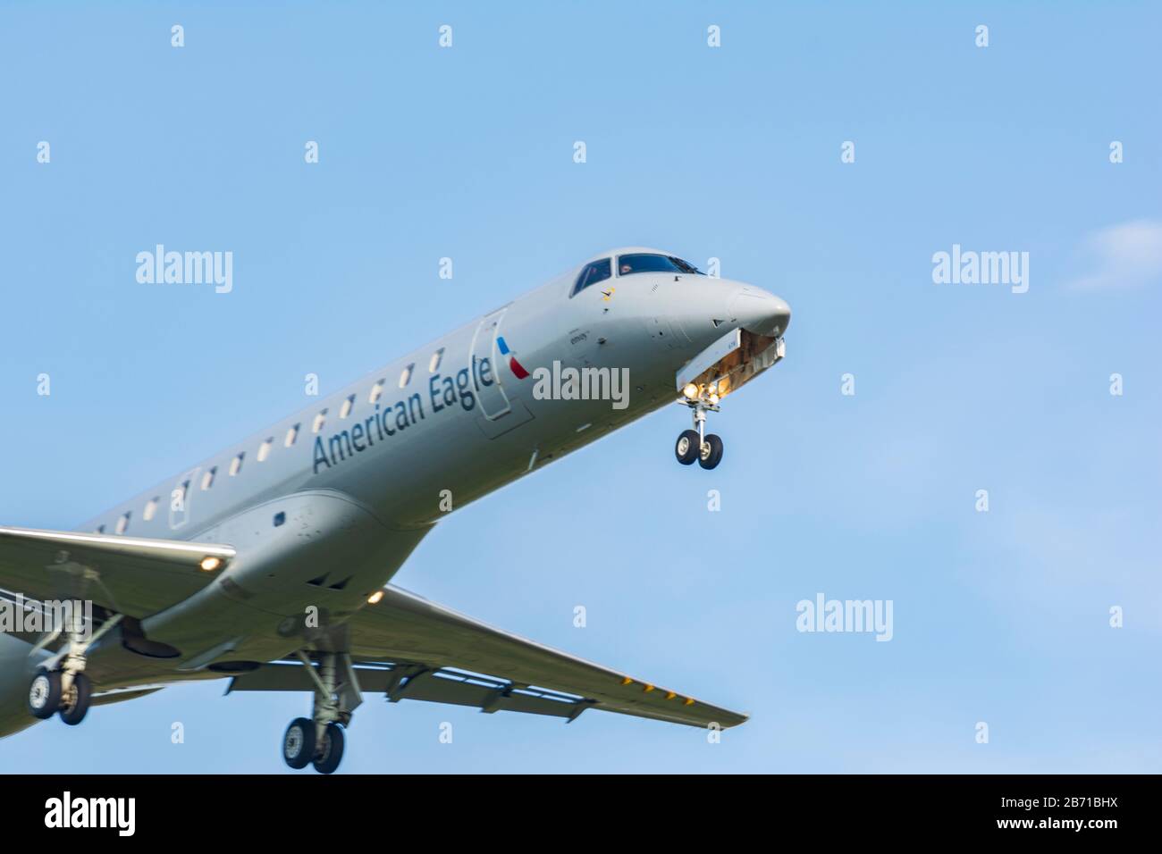 American Eagle Embraer ERJ-145 (twin-jet) landing at Lexington Bluegrass Field Stock Photo