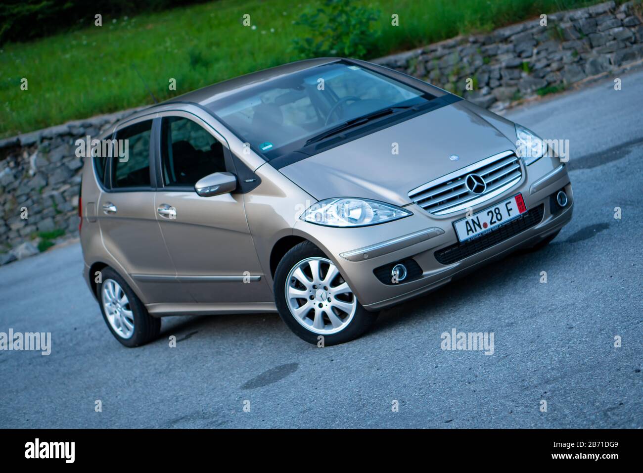 German Sedan Car Mercedes Benz A Class Type W203 Isolated In An Empty Parking Lot A Sunny Day Isolated Empty Parking Lot Stock Photo Alamy