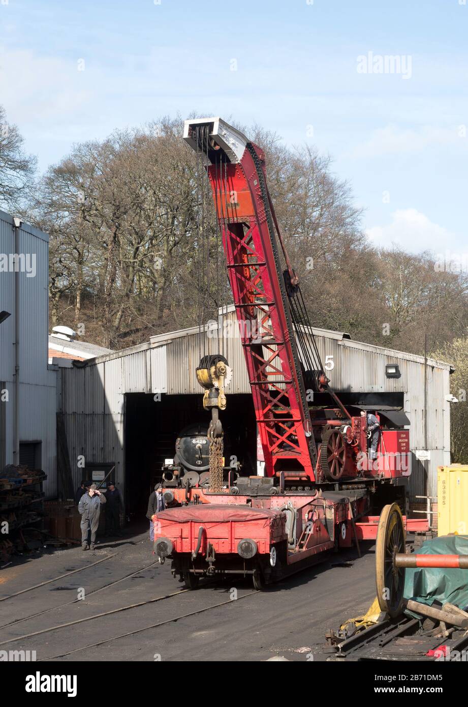 A steam crane in the yard of Grosmont engine shed, NYMR, North Yorkshire, England, UK Stock Photo