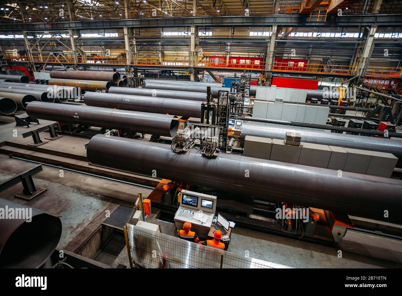 Steel pipe internal seam welding by longitudinal tack welding machine Stock Photo Alamy