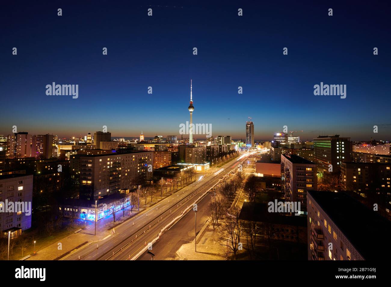 Berlin, Germany. 12th Mar, 2020. Evening view of the city centre with the television tower and Karl-Marx-Allee with the Park Inn Hotel (centre). Credit: Annette Riedl/dpa-Zentralbild/ZB/dpa/Alamy Live News Stock Photo