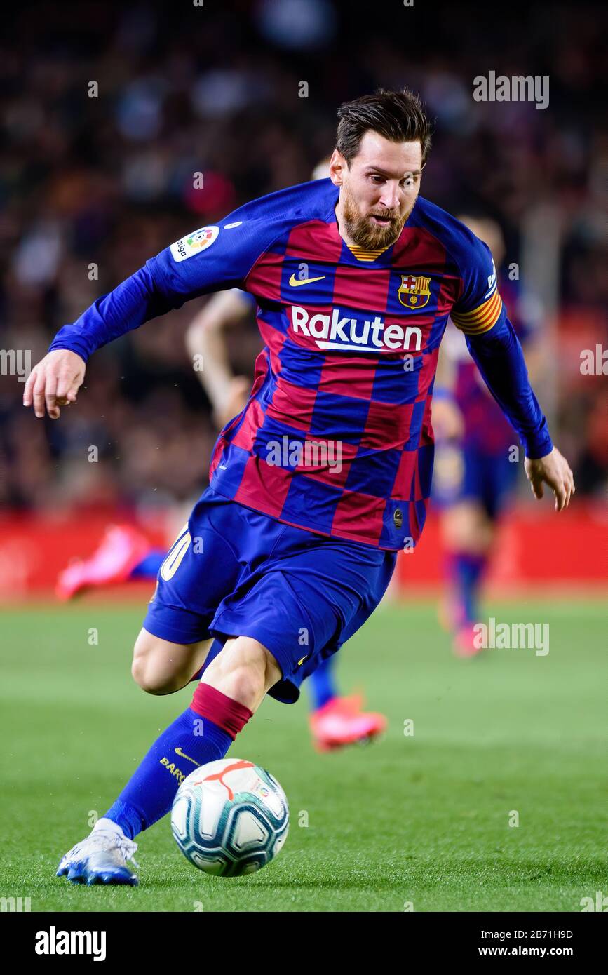 BARCELONA - MAR 7: Lionel Messi plays at the La Liga match between FC Barcelona and Real Sociedad de Futbol at the Camp Nou Stadium on March 7, 2020 i Stock Photo