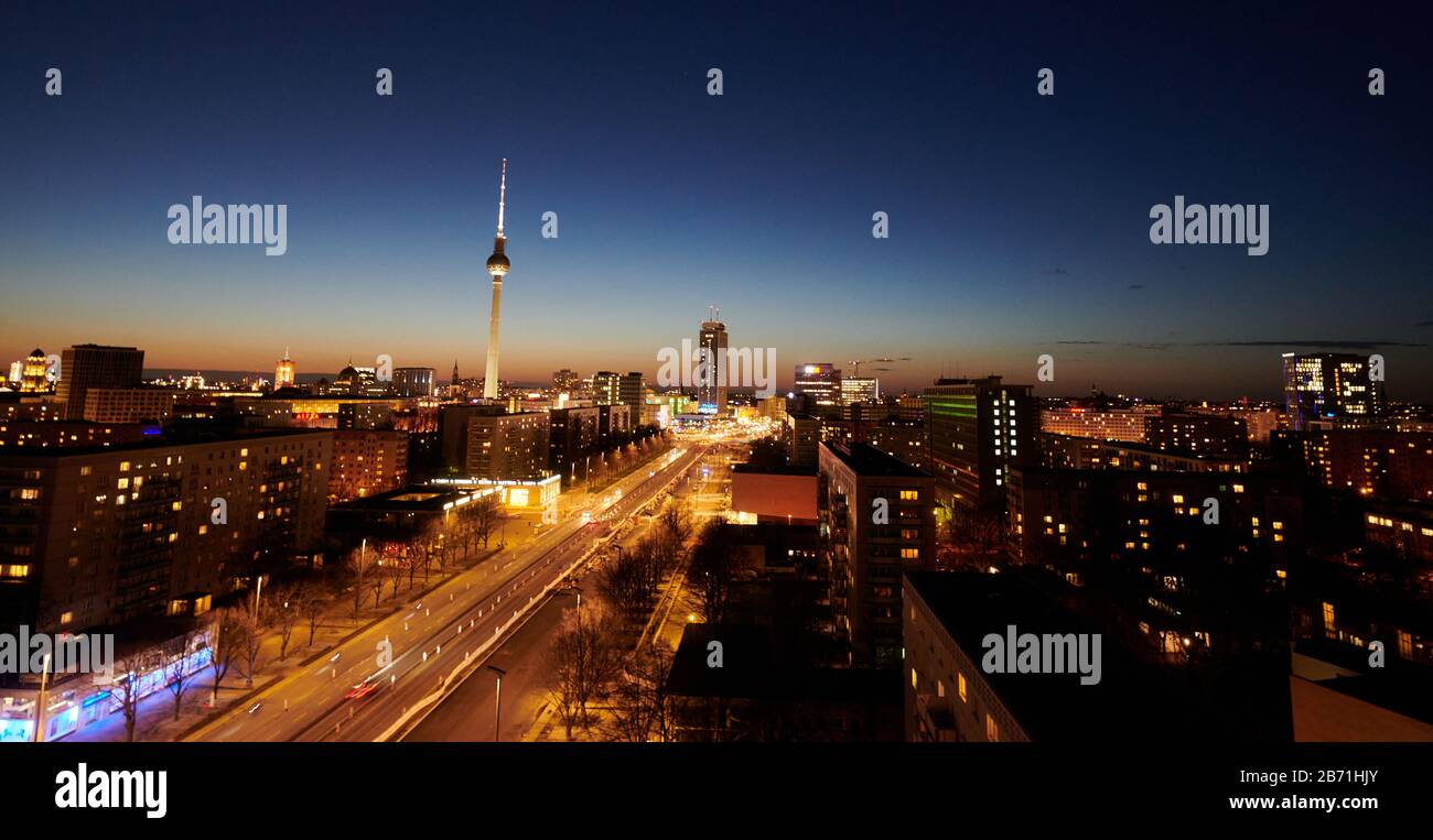 Berlin, Germany. 12th Mar, 2020. Evening view of the city centre with the television tower and Karl-Marx-Allee with the Park Inn Hotel (centre). Credit: Annette Riedl/dpa-Zentralbild/ZB/dpa/Alamy Live News Stock Photo