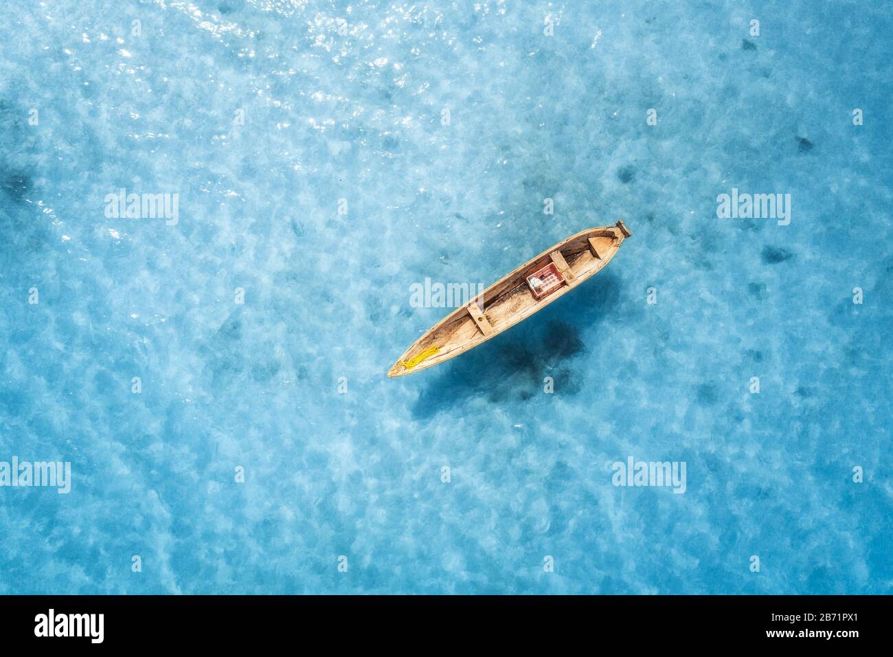 Aerial view of the fishing boat in transparent blue water Stock Photo ...