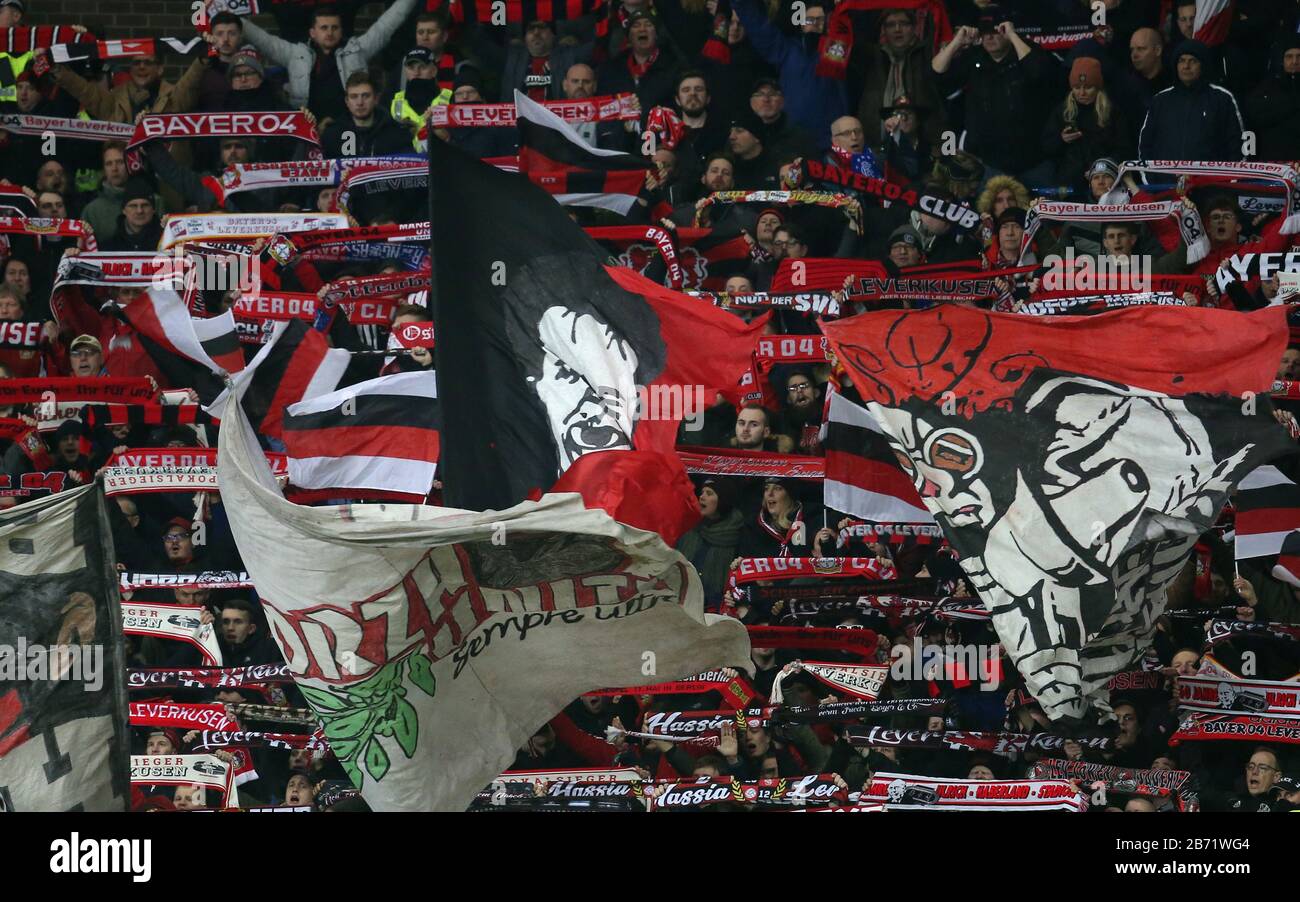 Bayer Leverkusen fans in the stands during the UEFA Europa League round of  16 first leg match at Ibrox Stadium, Glasgow Stock Photo - Alamy
