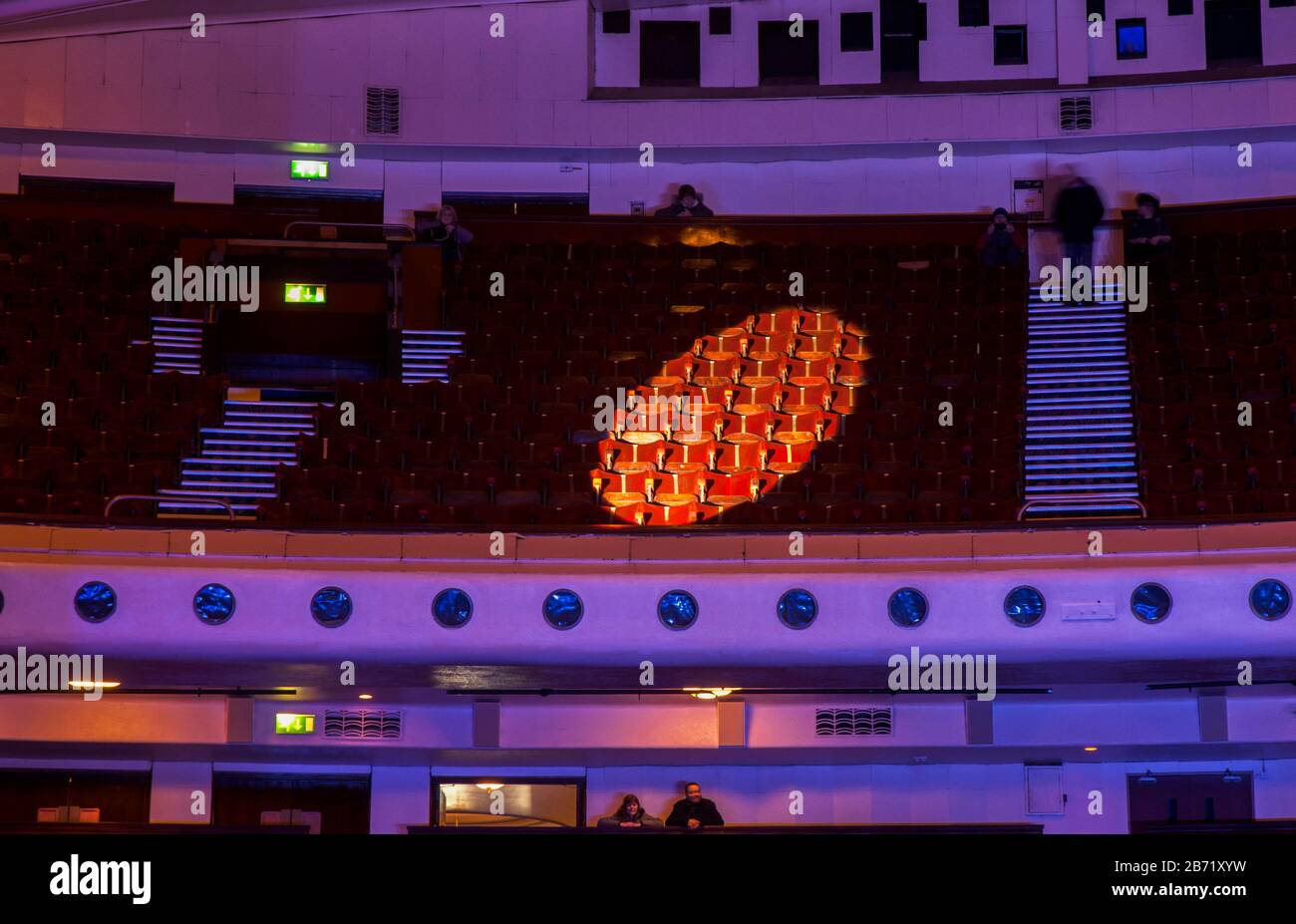 Theatre spotlight in the Opera House Blackpool shining on seats in the balcony. Stock Photo