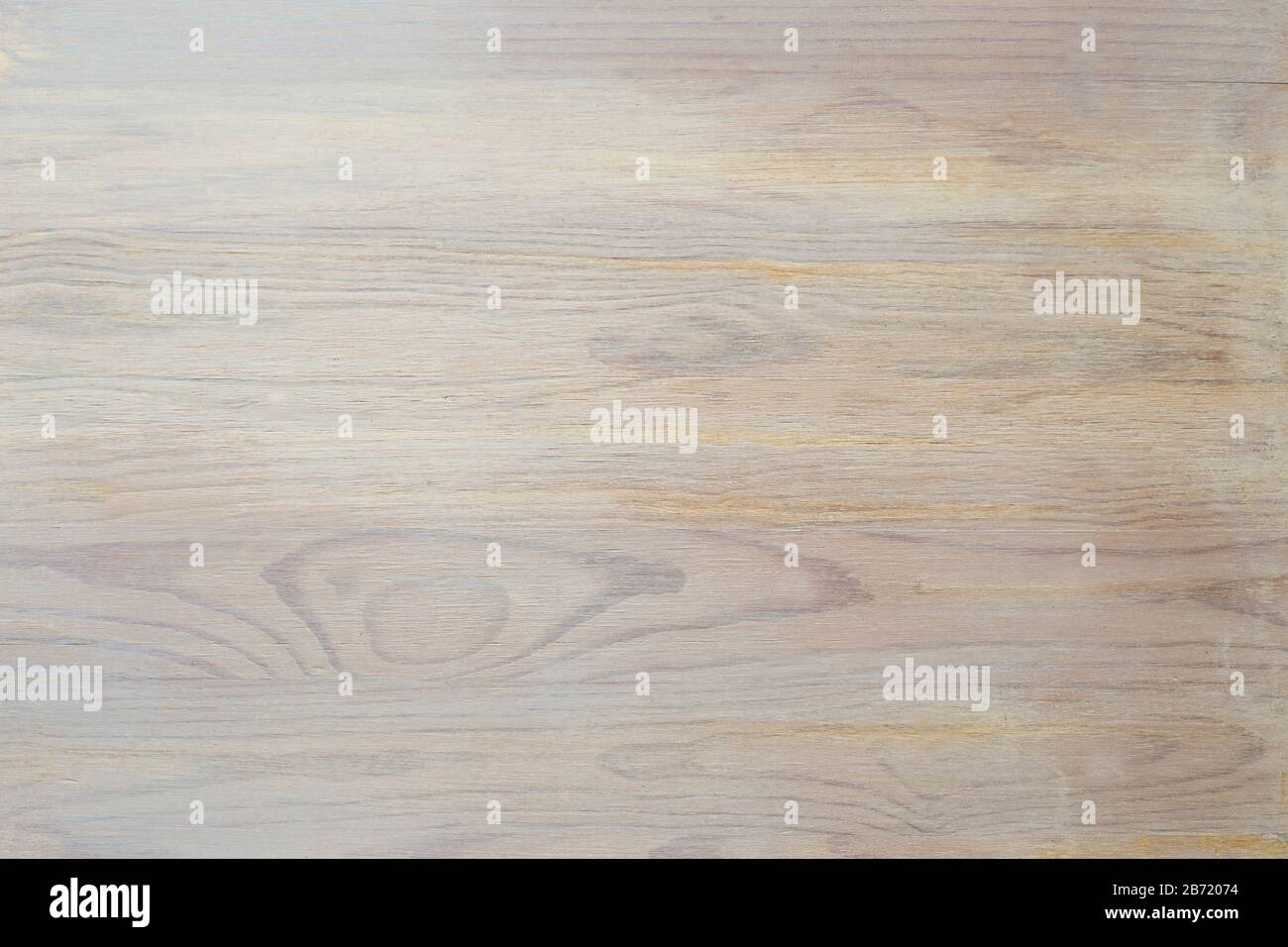 A wood table in light, yellow, ochre and orange tones, for background of invitation or celebration, or catalogue of carpentry and construction works Stock Photo
