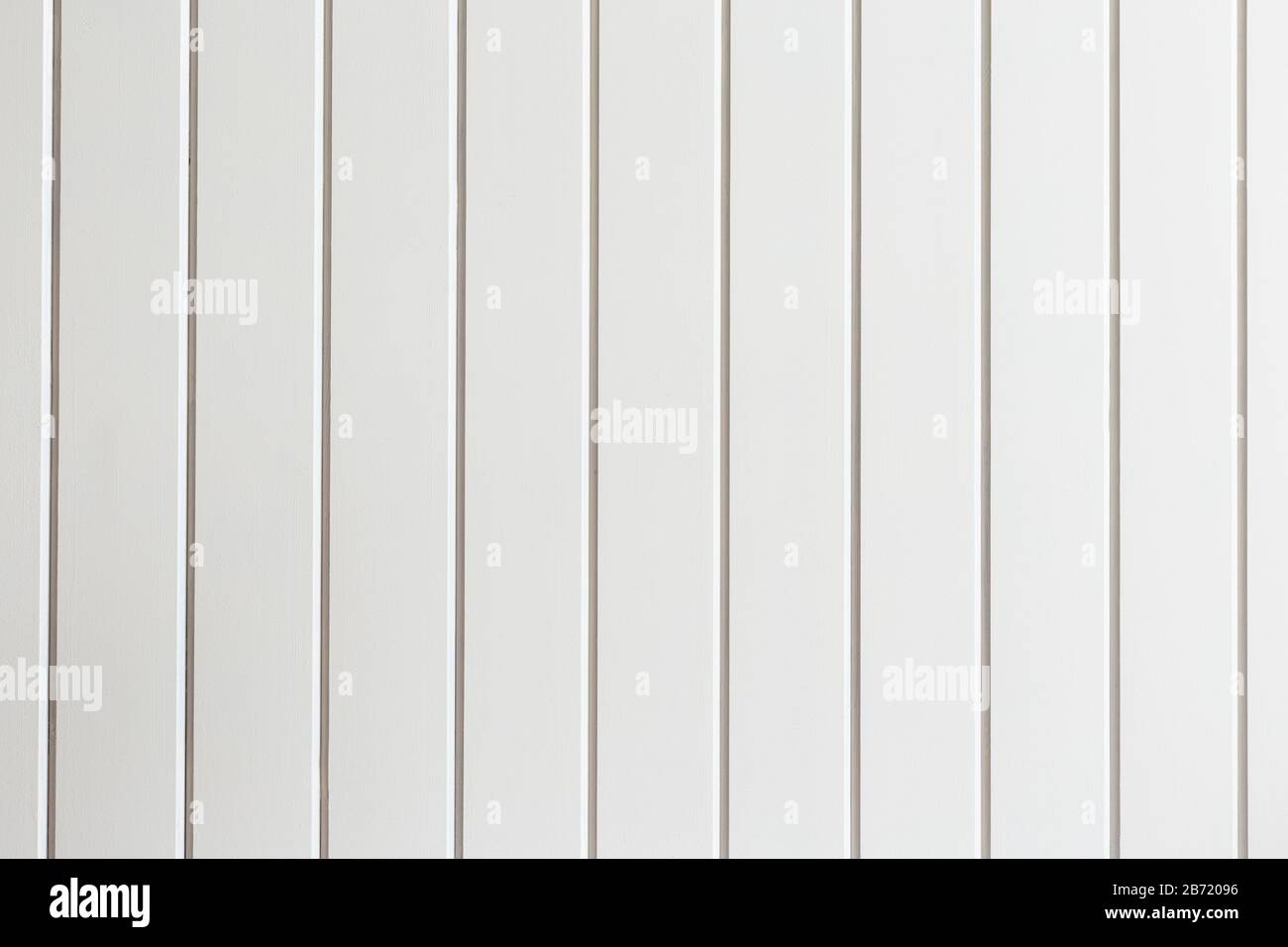 A white wooden boards in vertical position, for background or sample carpentry and construction work Stock Photo