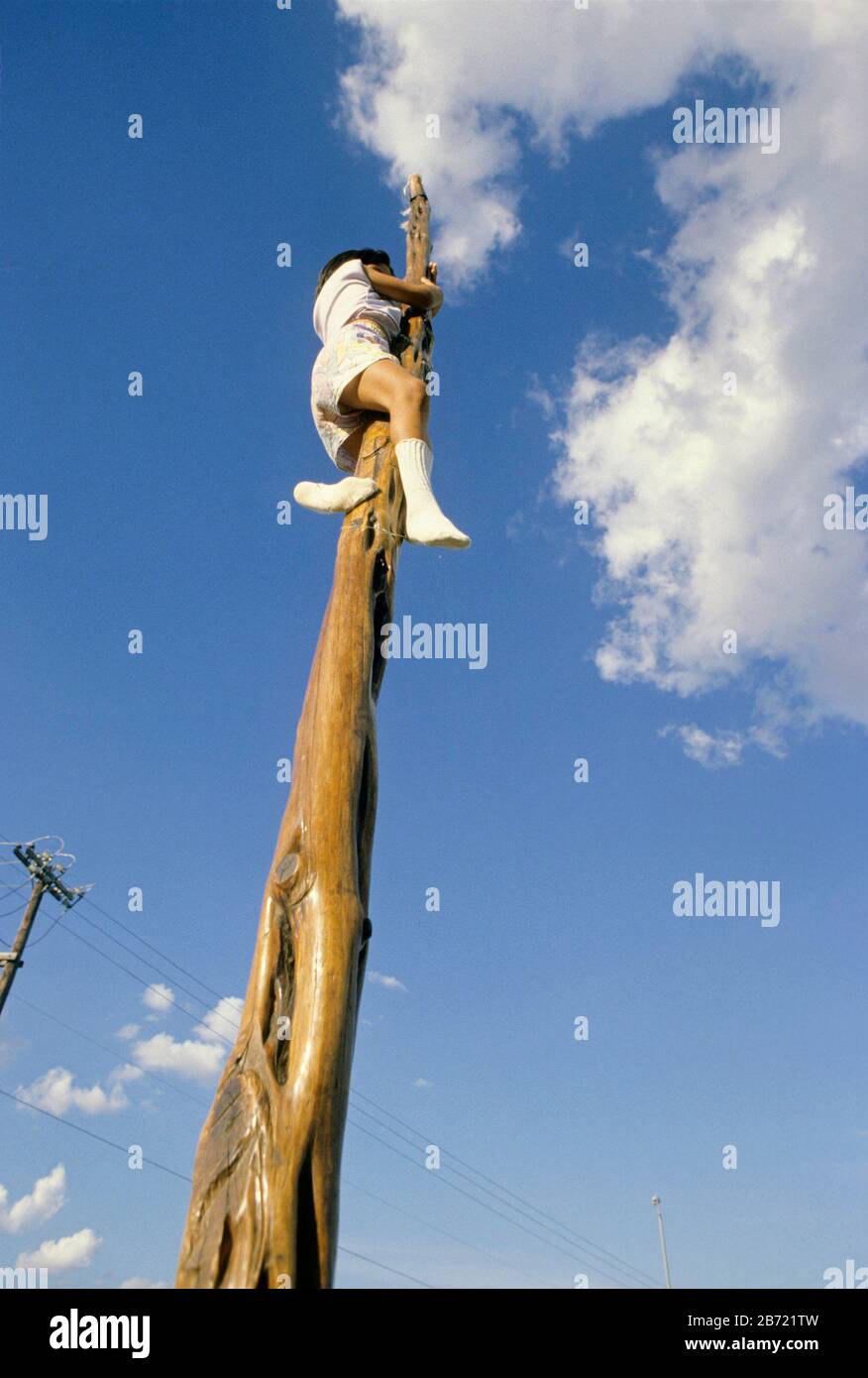 Girl climbing wodden pole hires stock photography and images Alamy