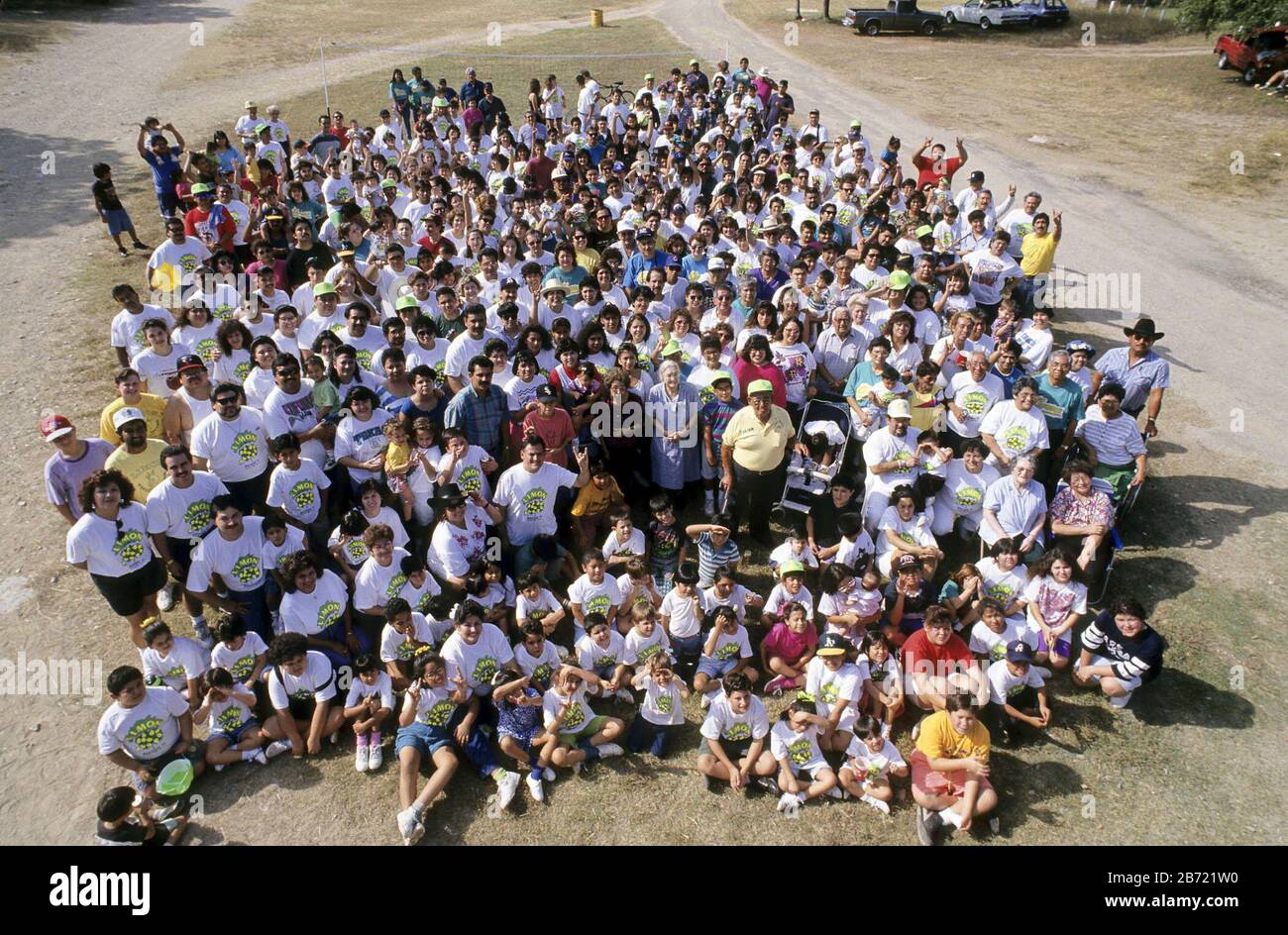 Austin Texas USA: Members of a large extended Hispanic family pose for a group photo during an annual reunion picnic. ©Bob Daemmrich Stock Photo