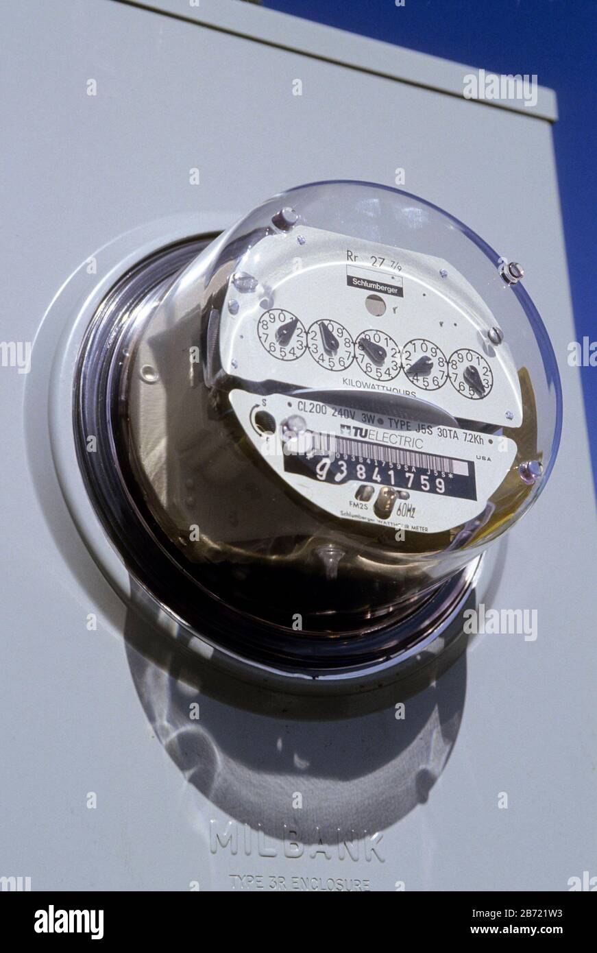 Electrical meter on pole, showing inner workings of meter. ©Bob Daemmrich Stock Photo