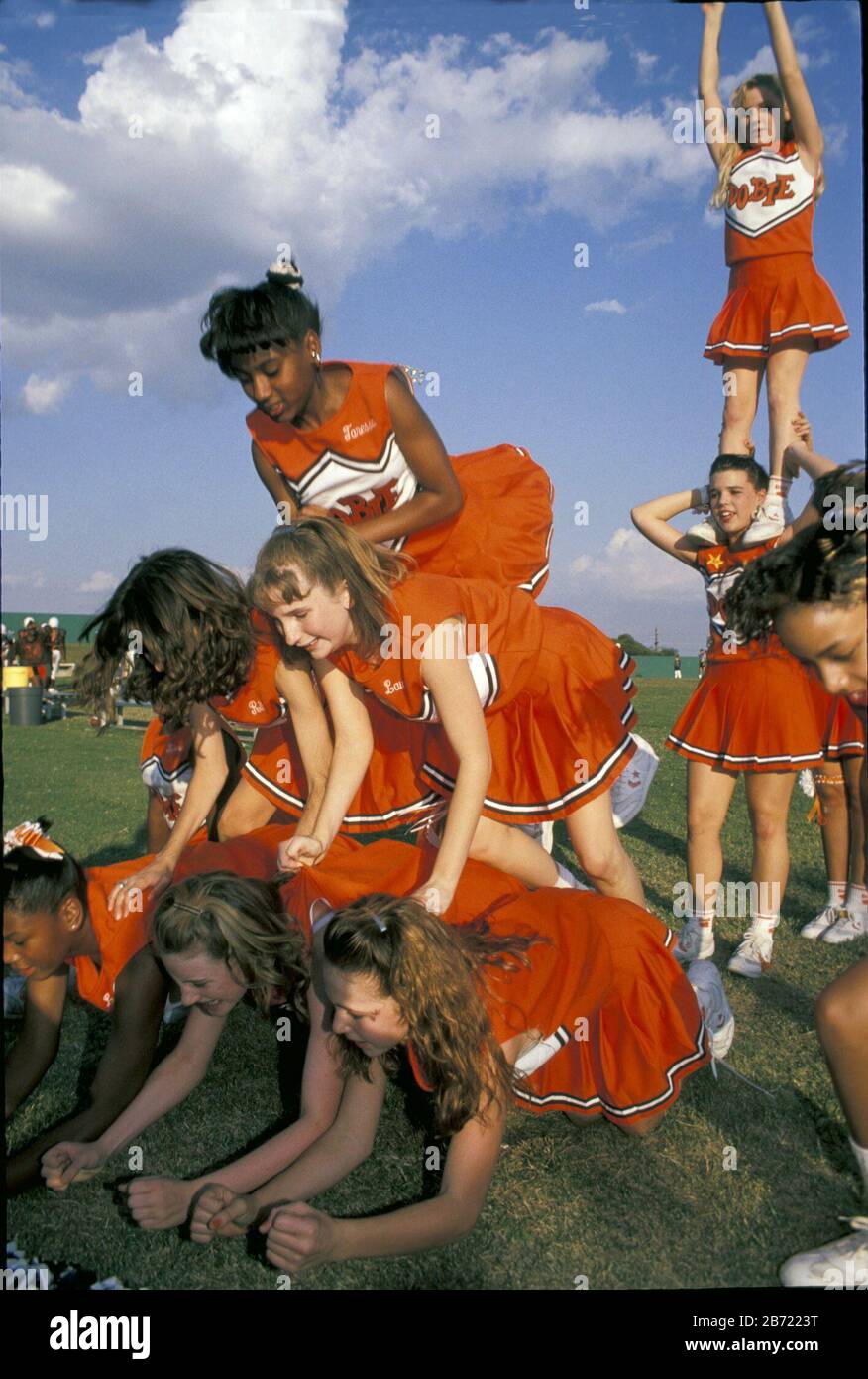 Cheerleaders on the Football Playground Forming Flower Editorial Image -  Image of cheerful, cheerleader: 129081360