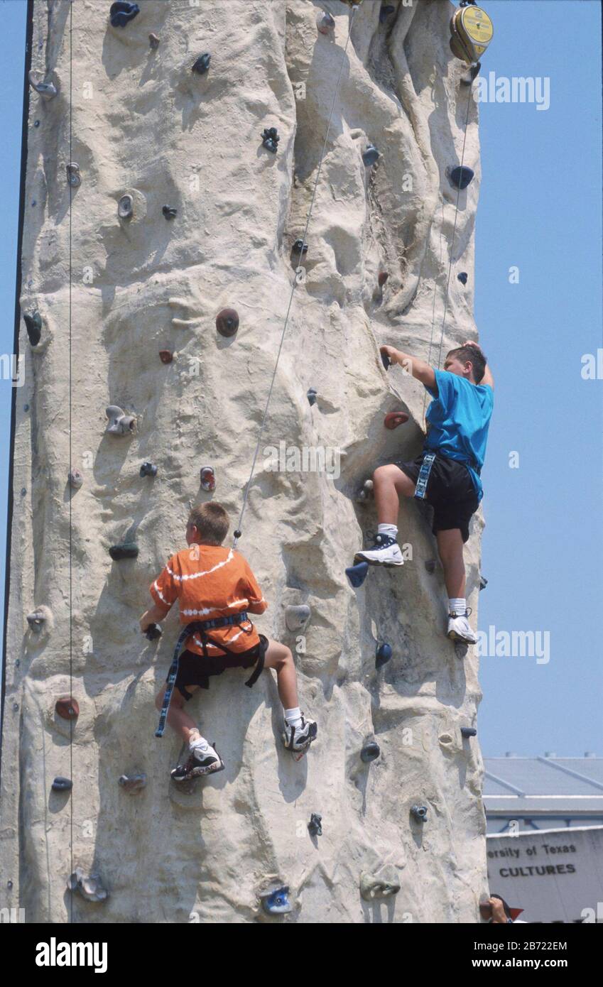 San Antonio, Texas USA Children scale climbing wall at the Texas
