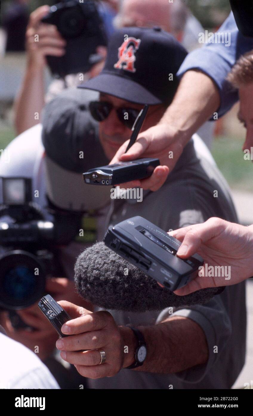 Fort Dodge, Iowa USA, July 15 1999: Members of the news media surround Texas Gov. George W. Bush (not shown) as he campaigns for president at Soldier's Park.  ©Bob Daemmrich Stock Photo