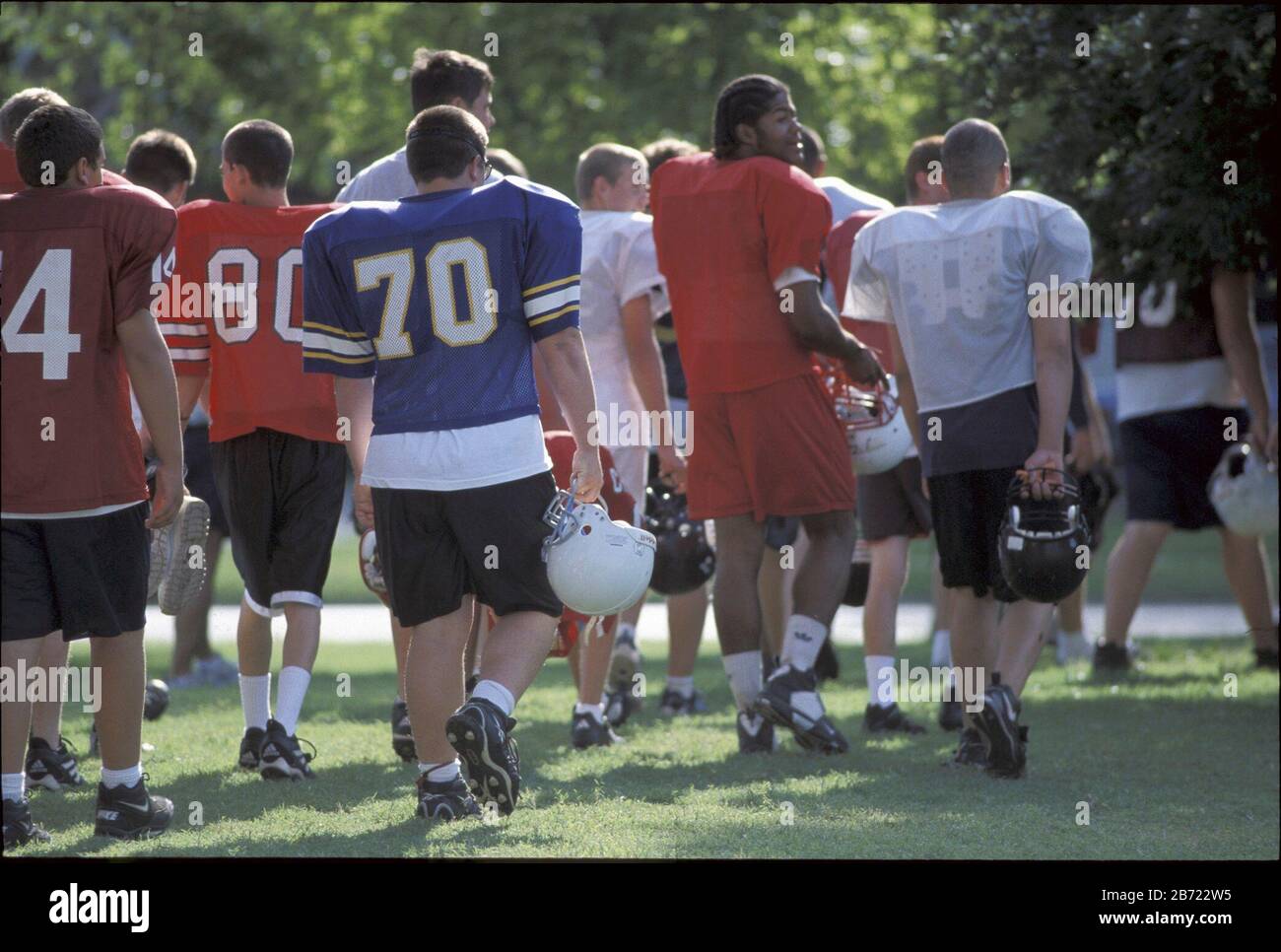 Norman, Oklahoma USA, June 2001 High school players walk toward practice field during summer