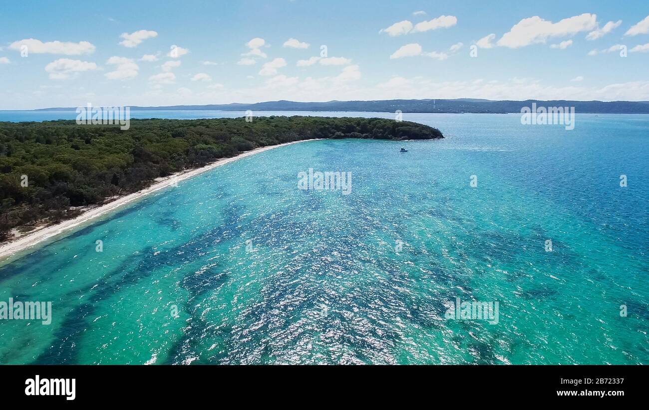 aerial view of the beach and waters of peel island in morton bay Stock Photo